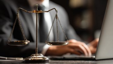 The lawyer uses legal contract management software.